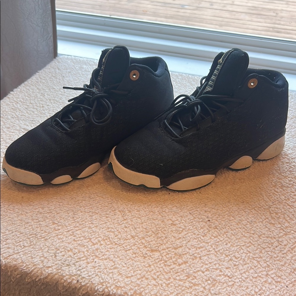 Jordan Black and White Sneakers with Holographic Detail